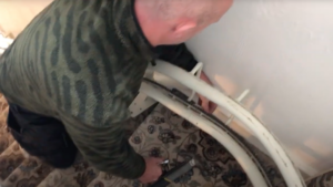 unscrewing the draw bolts